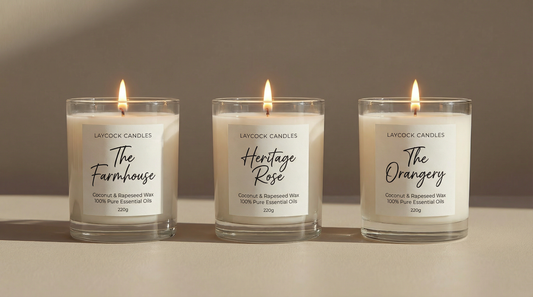 Three Laycock Candles luxury candles — The Farmhouse, Heritage Rose and The Orangery — hand poured in Yorkshire using coconut and rapeseed wax and 100% pure essential oils